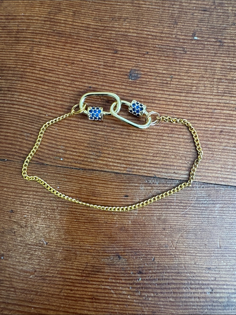 Hand-Crafted Gold Carabiner Chain Bracelet with Blue Crystal Accents